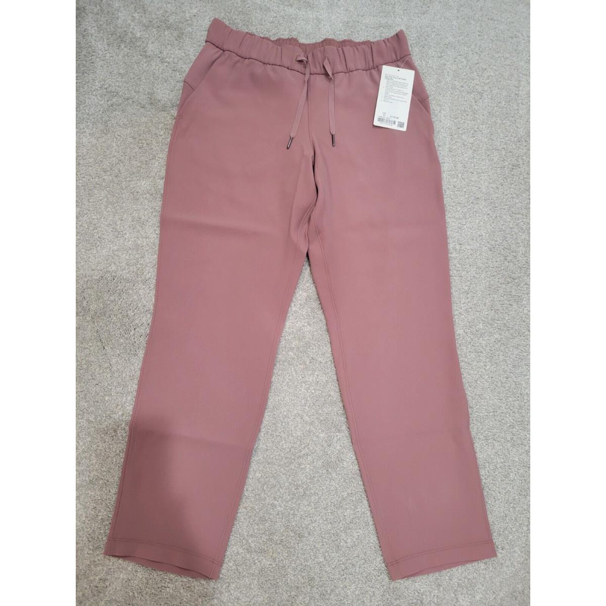 Lululemon On The Fly 7/8 Pant Woven Size 10 Color Red Dust