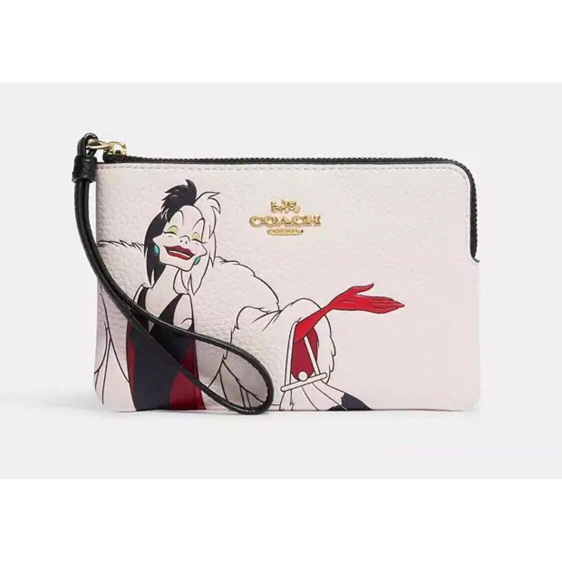 Coach X Disney Villains Cruella Chalk Wristlet with Gold Tone Paw Charm