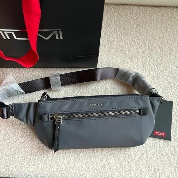 Tumi Meera Women`s Slim Waist Fanny Pack Grey Gray Silver Adjustable