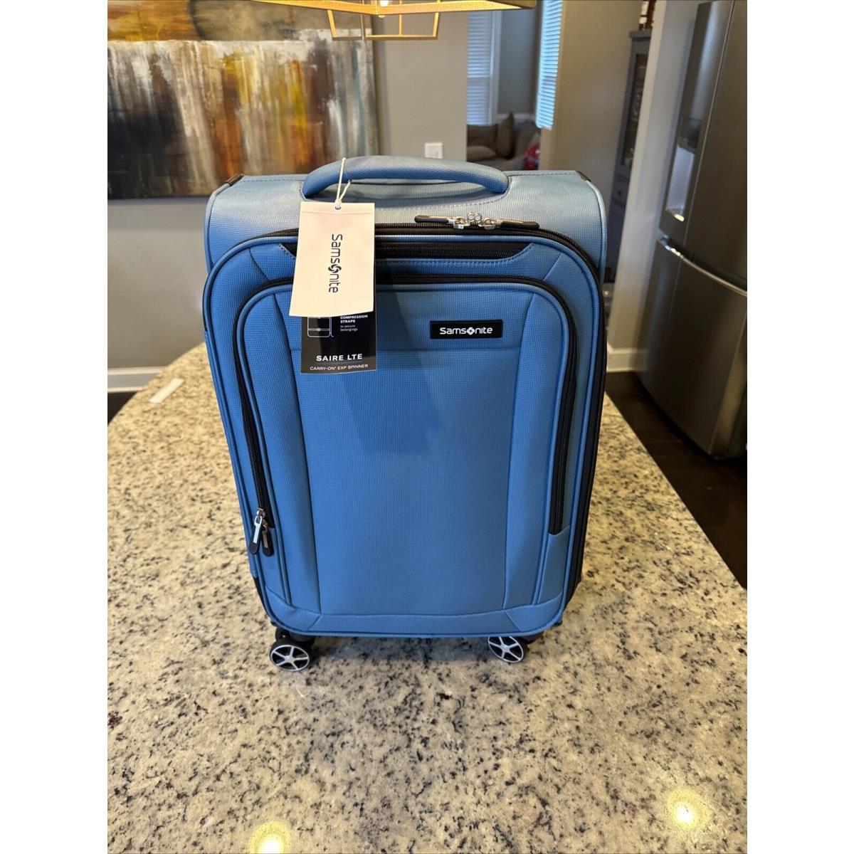 Samsonite Satire Lte 20 Softside Carry-on Spinner w 360 Caribbean Blue