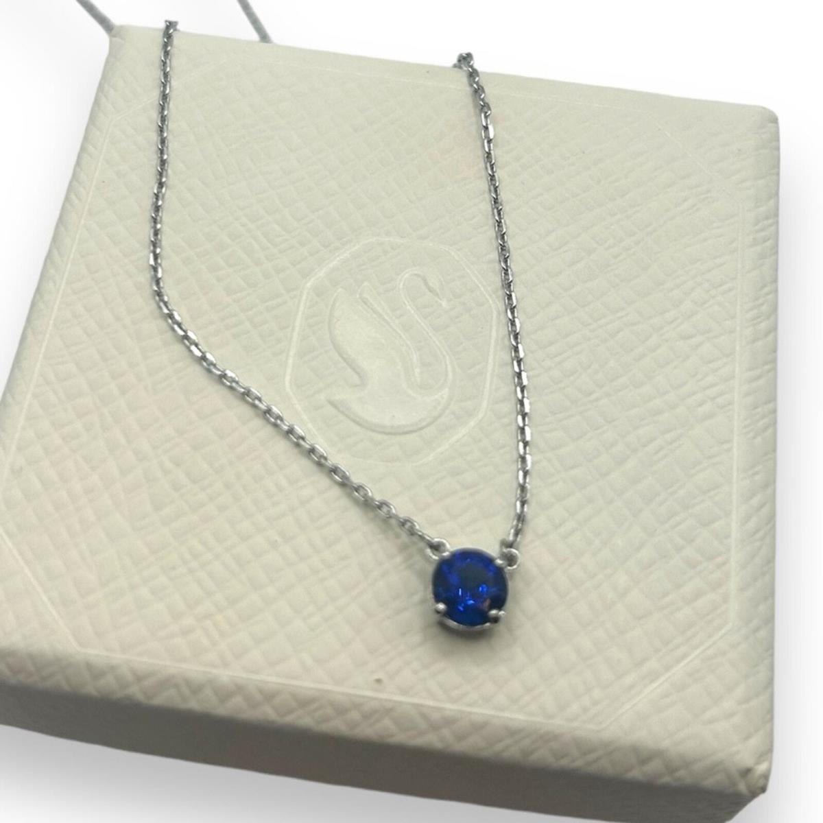 Swarovski Attract Round Sapphire Blue Pendant Rhodium Plated Silver