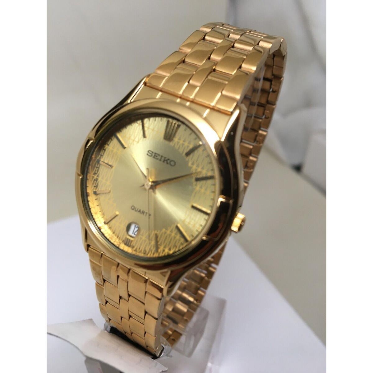 Seiko Quartz SNE486 Mid Size Gold Tone Gold Dial