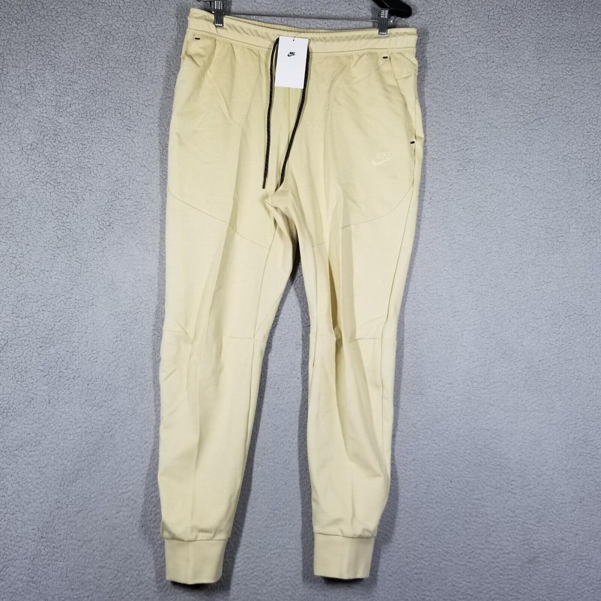 Nike Men`s Sportswear Tech Fleece Slim-fit Jogger Large JW7 Team Gold Taper