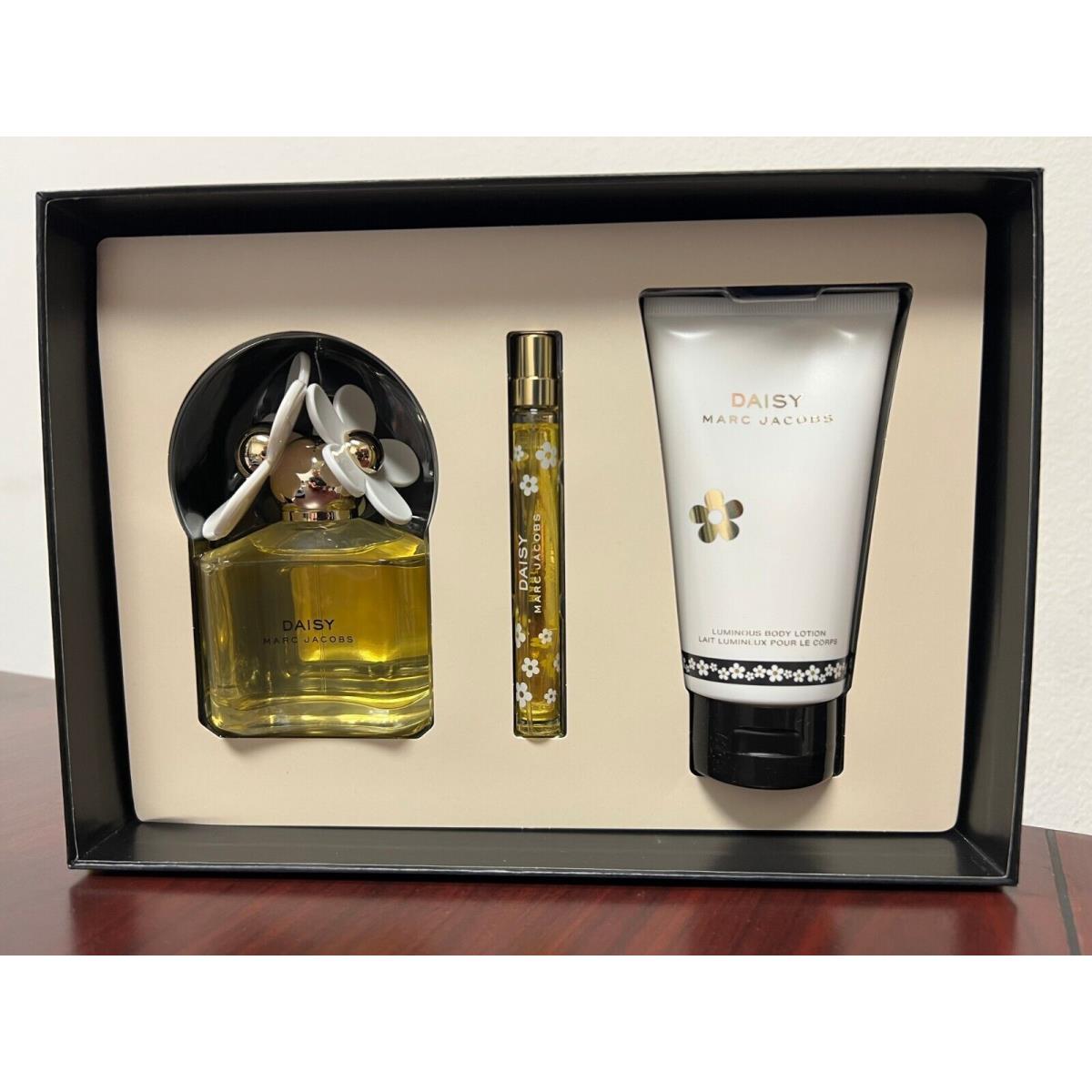 Daisy by Marc Jacobs 3 Pieces Gift Set: 3.4 Edt Spray 5.1 Lotion 10 ML Edt Spray