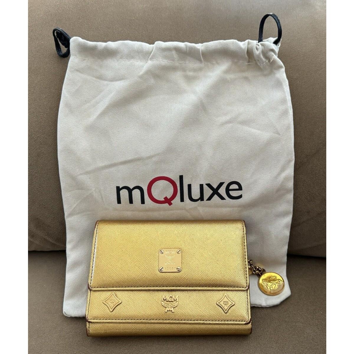 Mcm Women`s Gold Nos Trifold Half Wallet and Mqluxe Cloth Gift Retail Bag