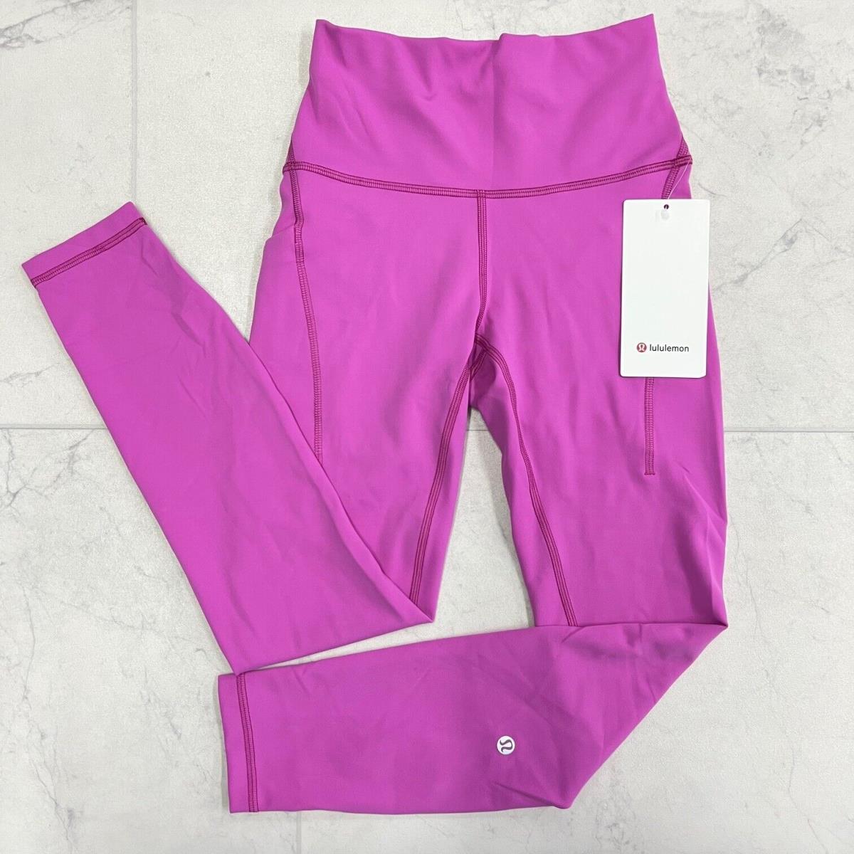 Lululemon Wunder Train HR Tight 25 Pockets In Pow Pink Tone Size: 4