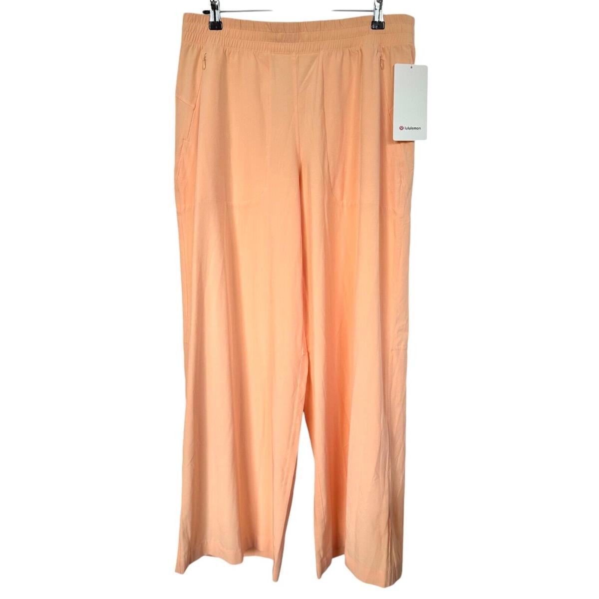 Lululemon Women`s Swift Wide-leg Mid-rise Pant Size 12 Peach