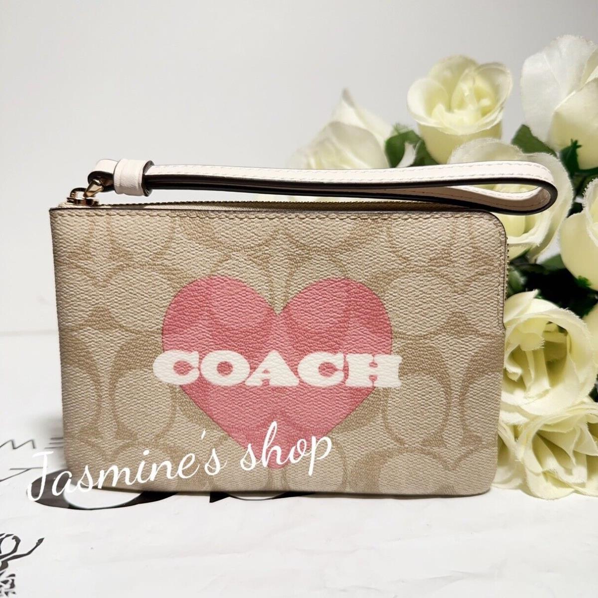 Coach Corner Zip Wristlet In Signature Canvas with Heart Print CP436