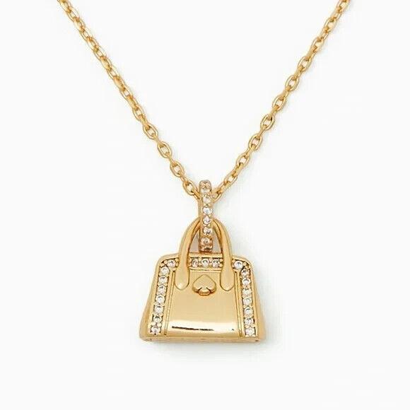 Kate Spade Gold Handbag Pendant Necklace. Retail