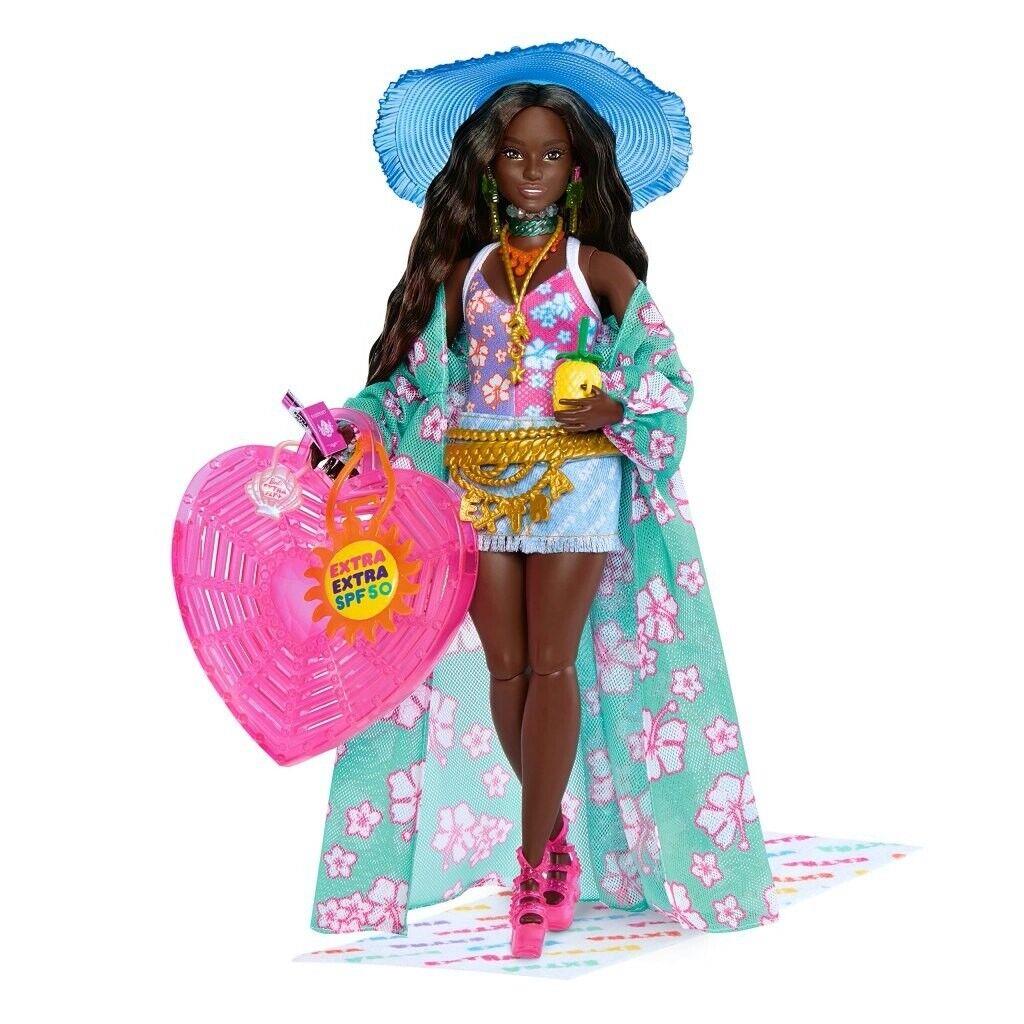 Mattel Barbie Travel Barbie Doll with Beach Fashion HPB14