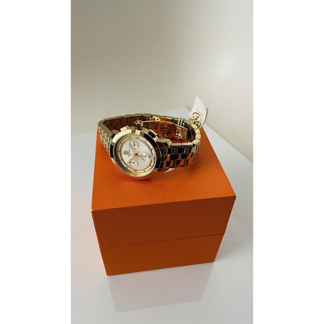 Tory Burch TRB1000 Women`s Sunray Ivory Dial Chronograph Date Gold-tone Watch