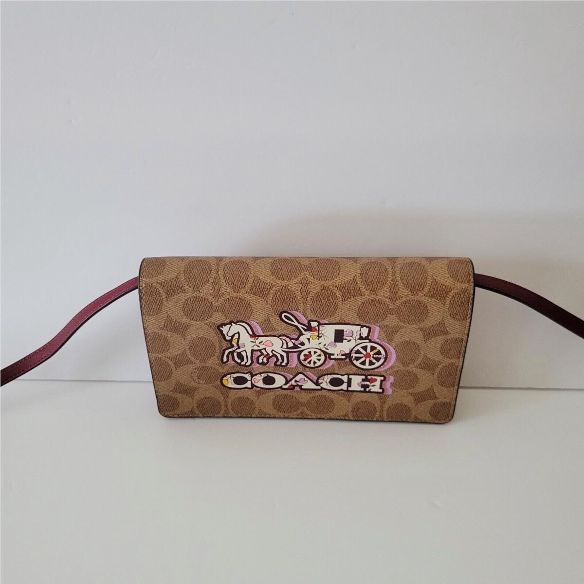 Coach CX597 Anna Foldover Signature Horse Carriage Crossbody Handbag Clutch Tan