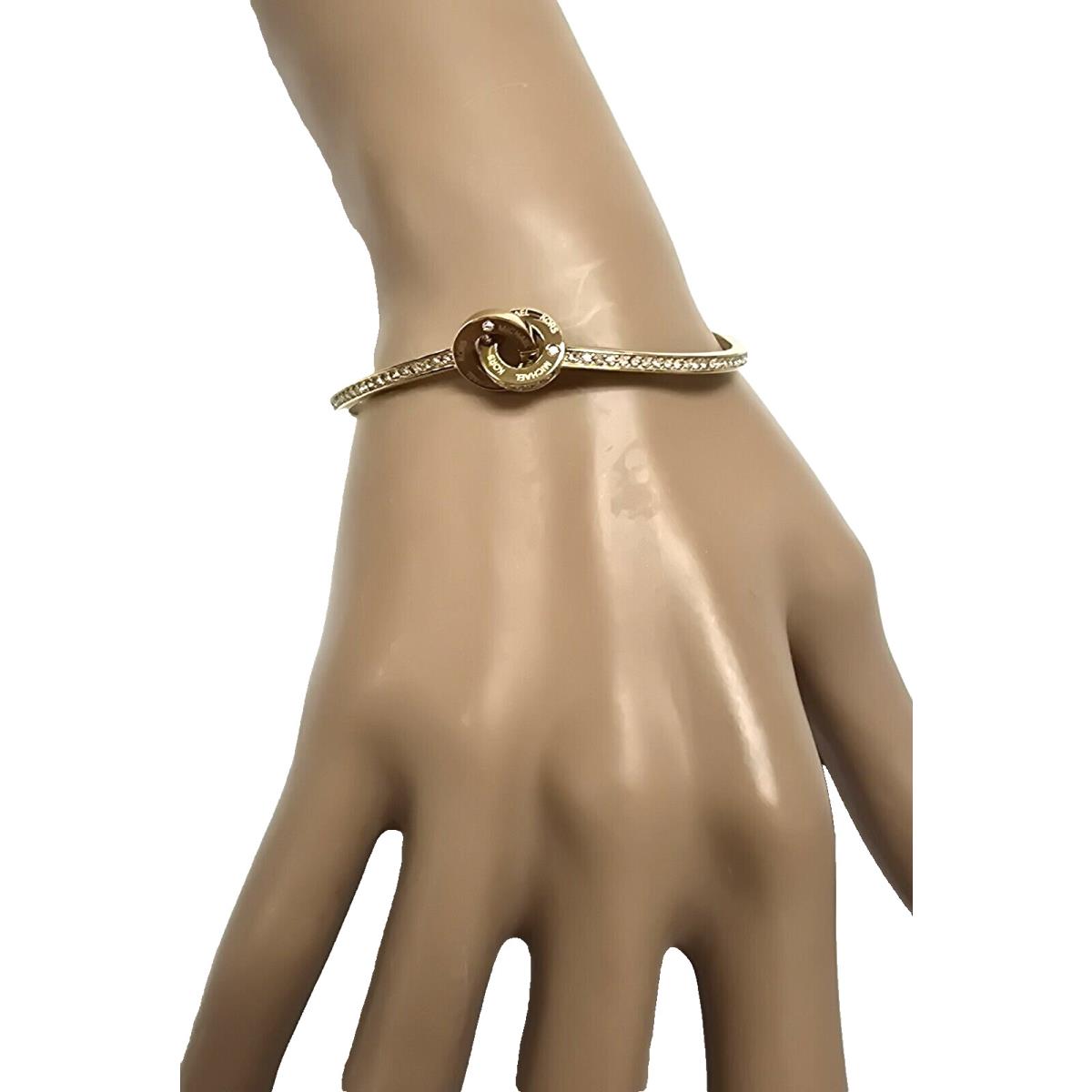 Michael Kors Gold Tone Interlocking Ring Crystals Logo Brass Bangle Bracelet