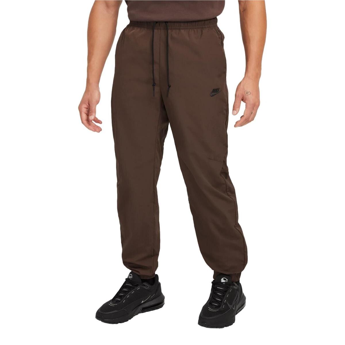 Nike Sportswear Men`s Tech Woven Tapered Leg Joggers FZ0758-237 Brown