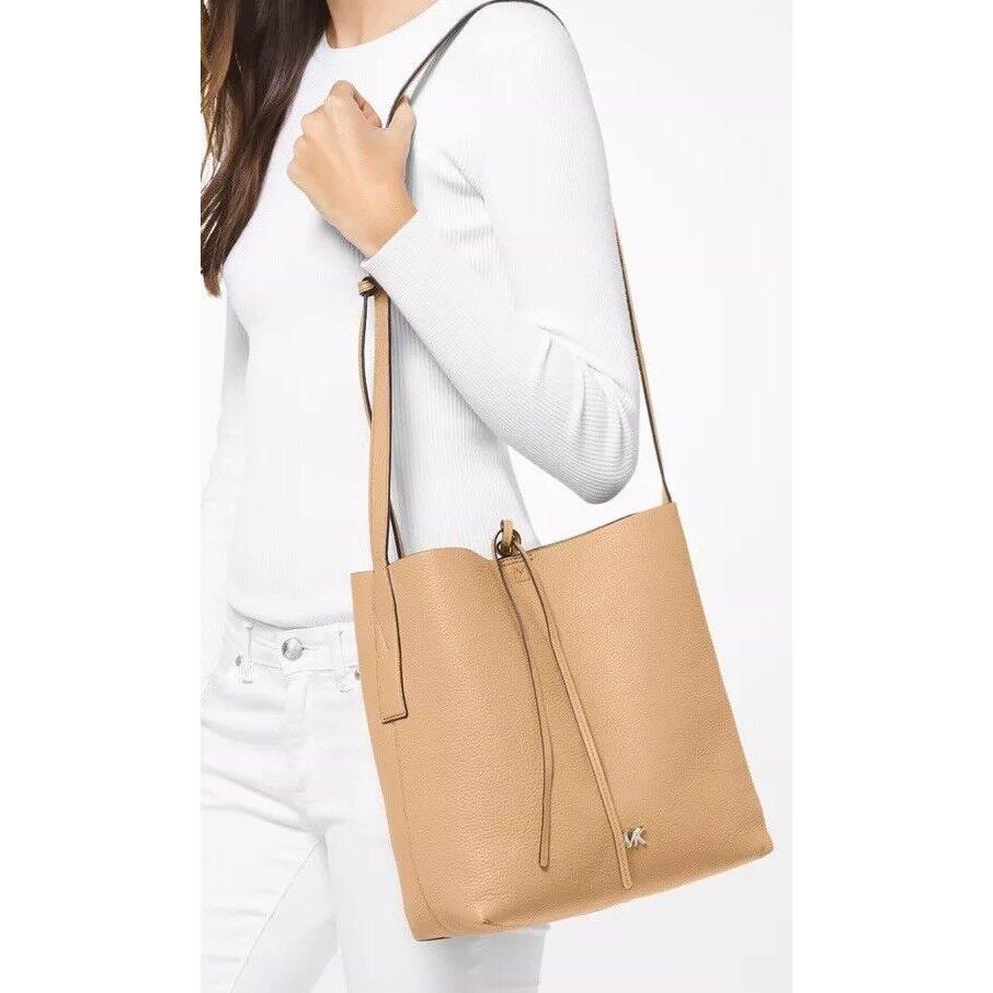 Michael Kors Junie Messenger Butternut Gold Leather Tie Snap Accent Bag Tote - Exterior: butternut gold