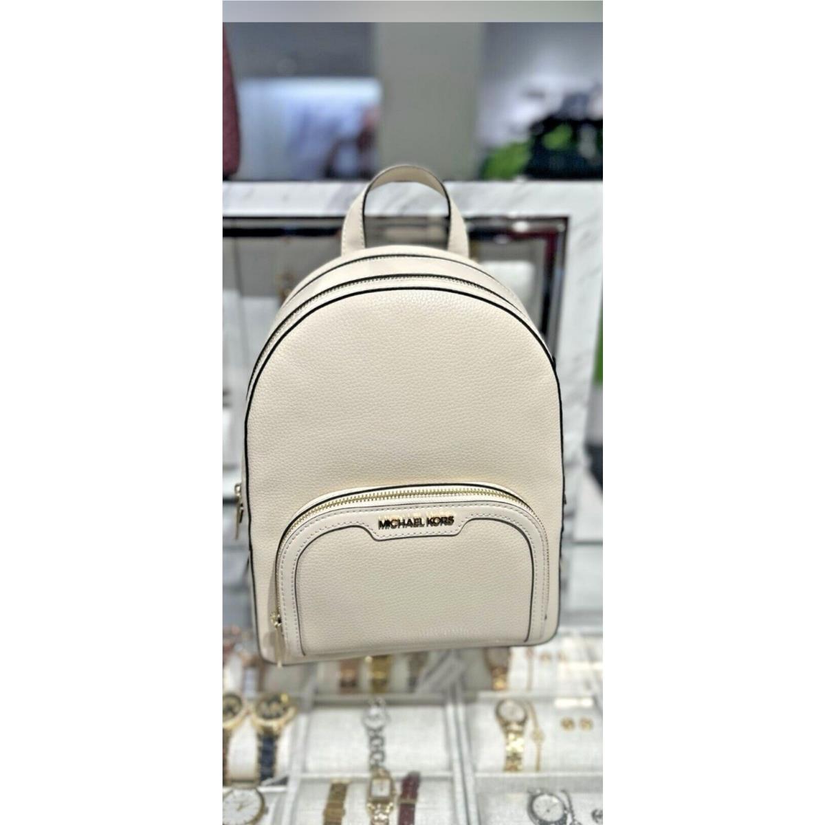 Michael Kors Jaycee Medium Pebble Leather Zip Pocket Backpack Cream