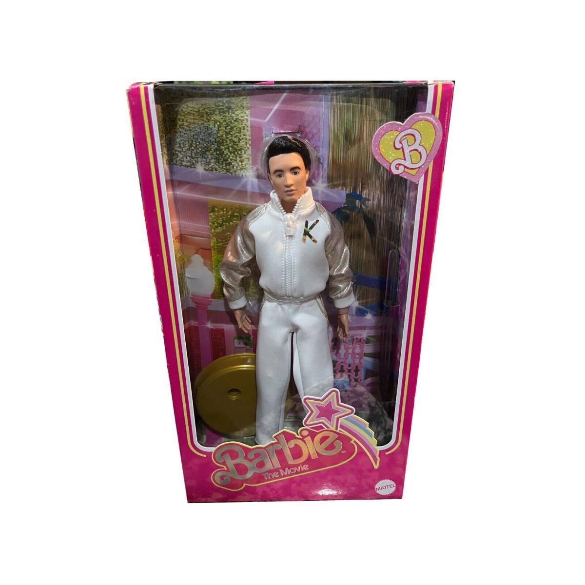 Barbie The Movie Ken Doll in White and Gold Tracksuit Mattel