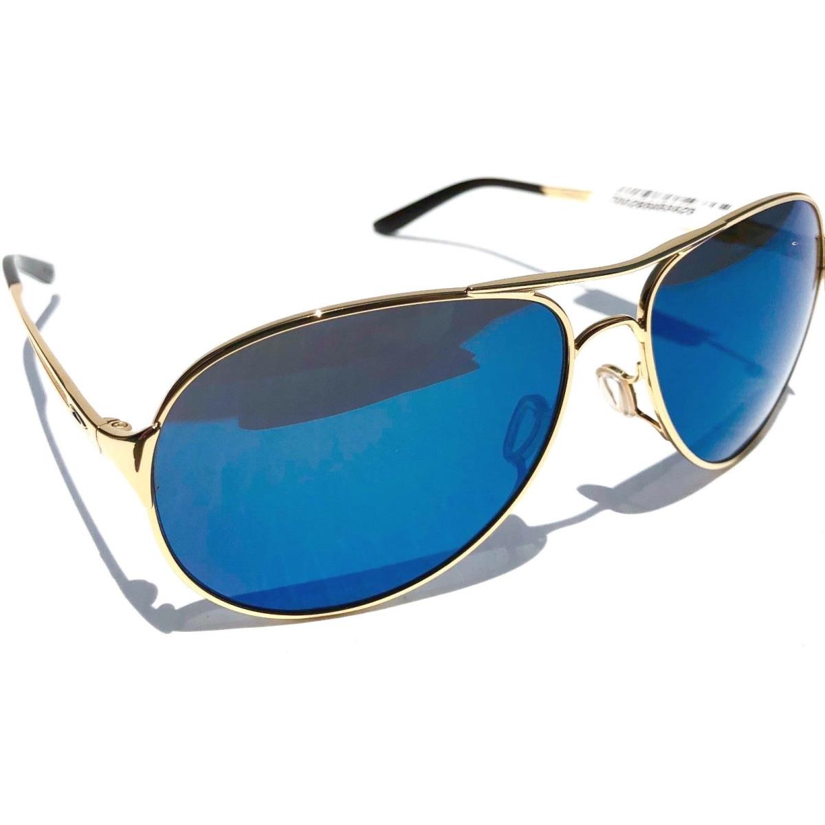 Oakley Caveat Gold 60mm Aviator Blue Ice Iridium Women`s Sunglass 4054-16