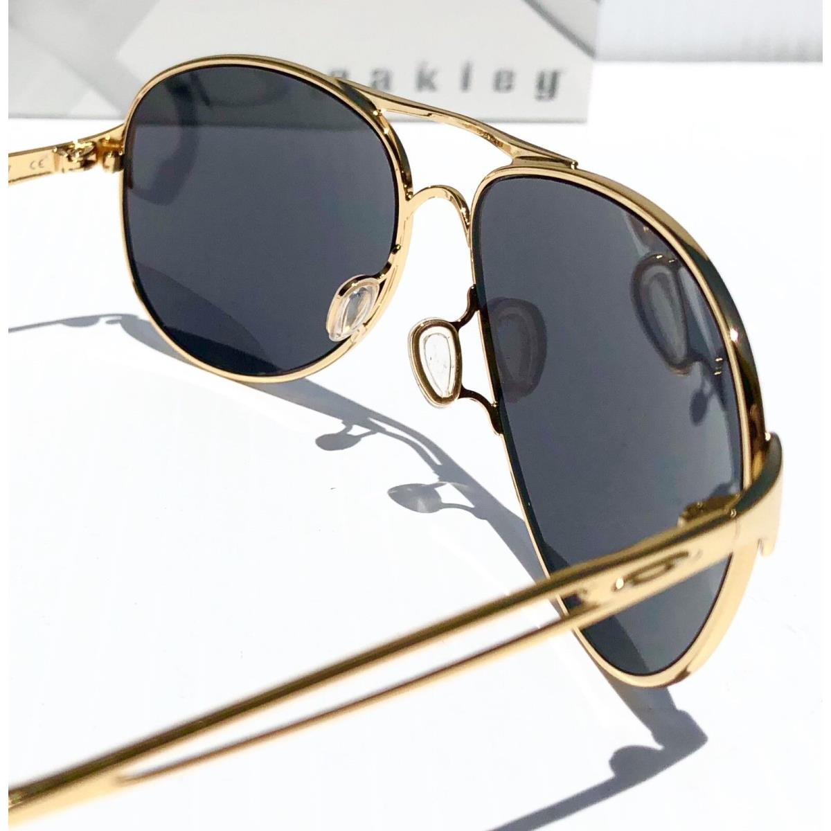 Oakley sunglasses  - Gold , Gold Frame, Blue Lens