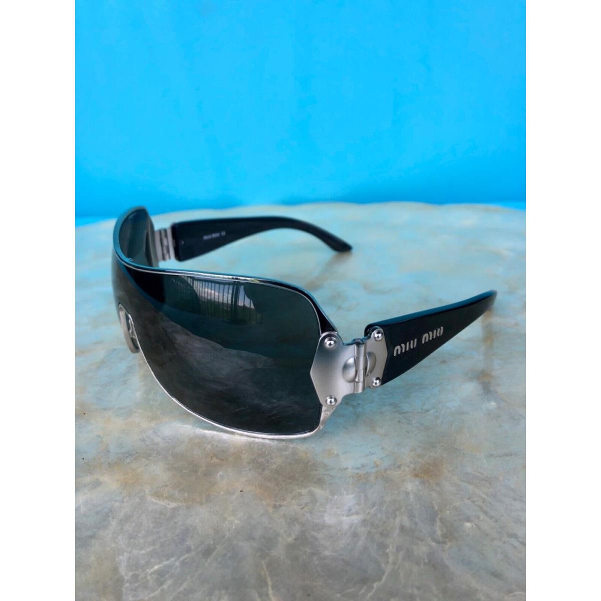 Miu Miu Silver Frame Black Arm Sunglasses SMU51G 1BC-1A1 115