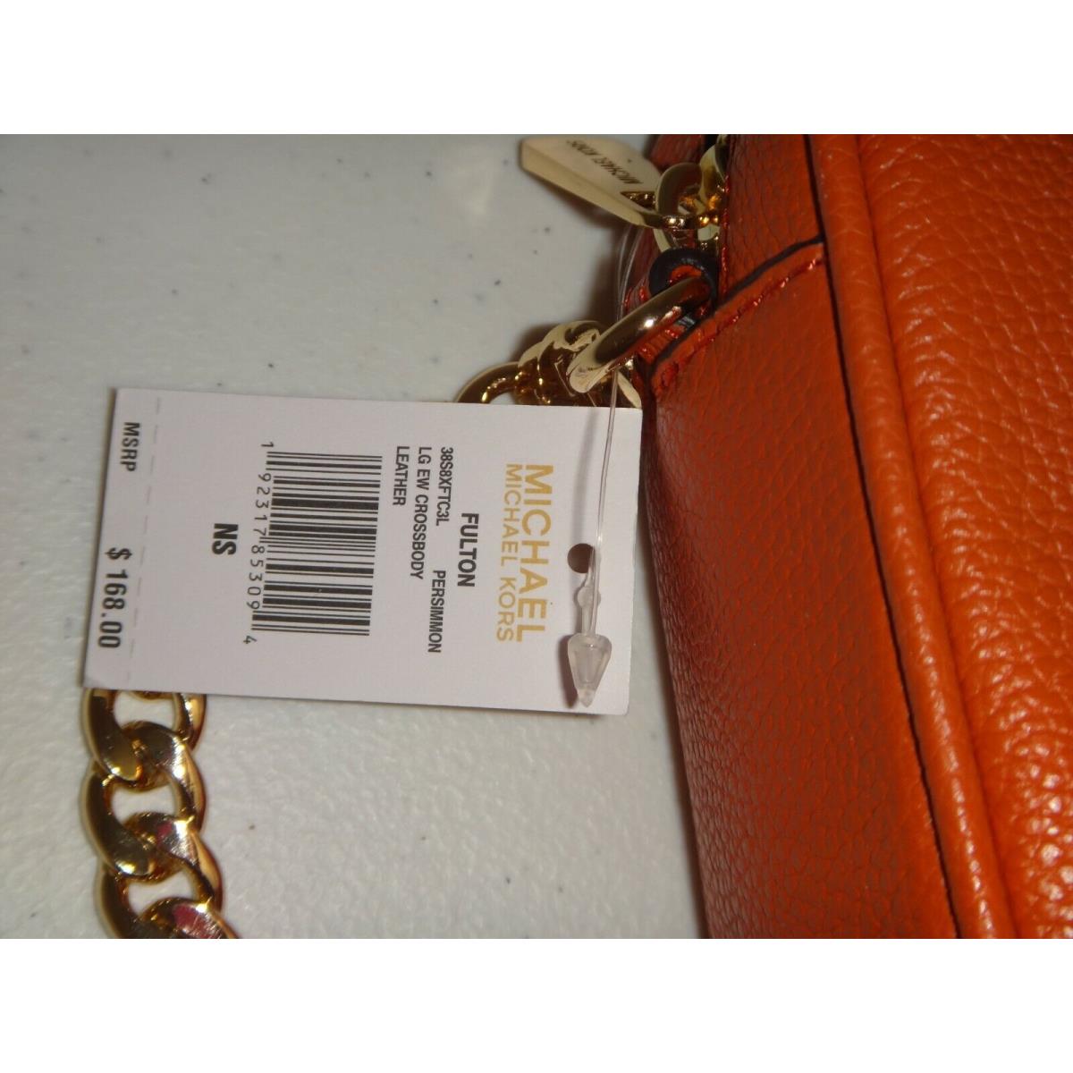 Buy the Michael Kors Orange Persimmon Leather Shoulder Handbag