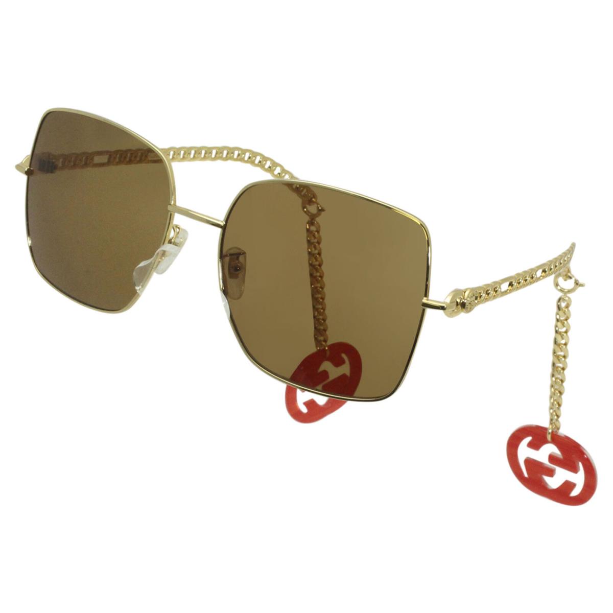 Gucci GG0724S 002 Sunglasses Gold/brown Lens Removable Heart Chain Earrings 61mm - Frame: Gold, Lens: Pink