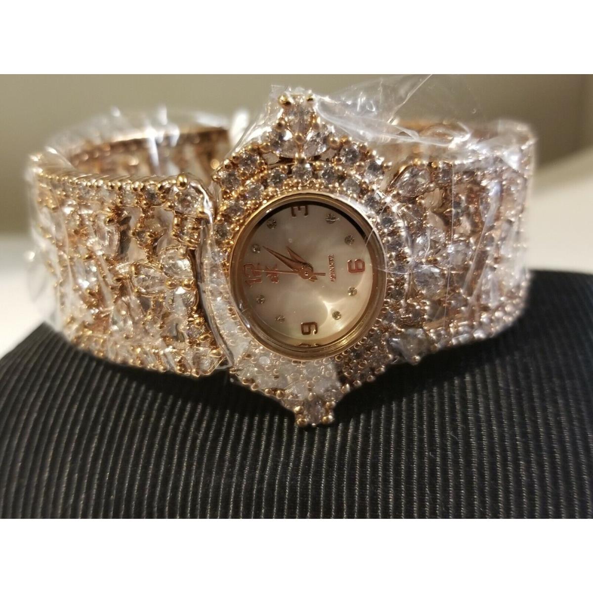 Adee Kaye Mother OF Pearl Dial Rose Tone Bangle Watch 7